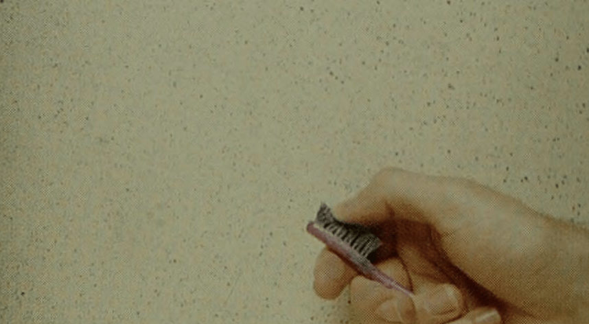 Flyspecking with a toothbrush